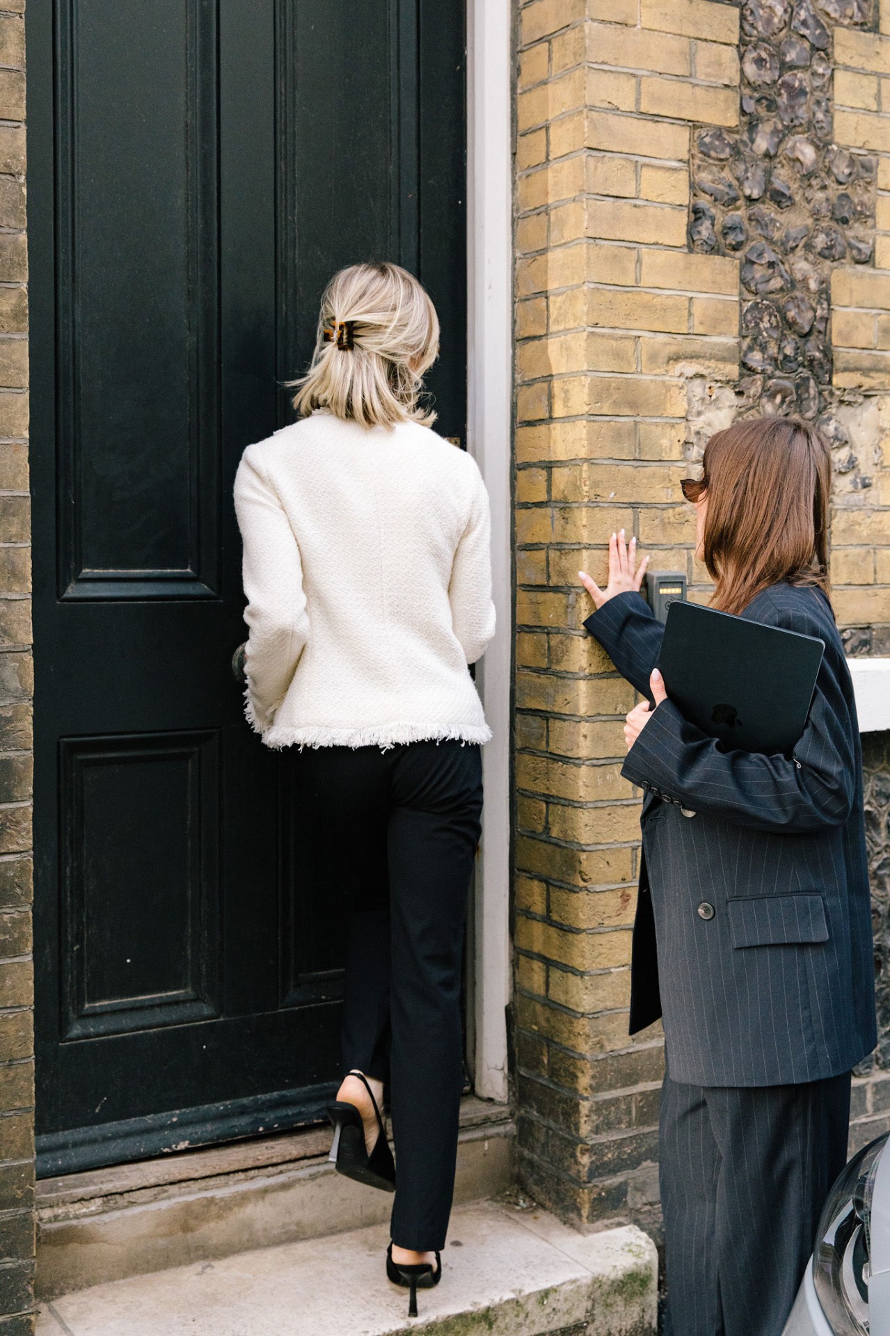 Alex Young and a colleague heading into a meeting